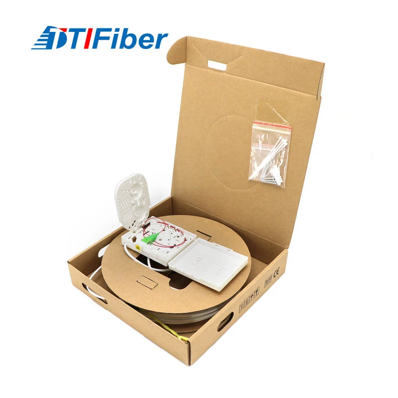 FTTH wall terminal box open showing splice tray and cable routing